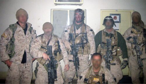 Jake and fellow Marines in uniform following a reconnaissance mission in Iraq